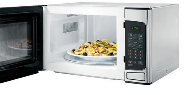 GE® 1.1 Cu. Ft. Stainless Steel Countertop Microwave-1