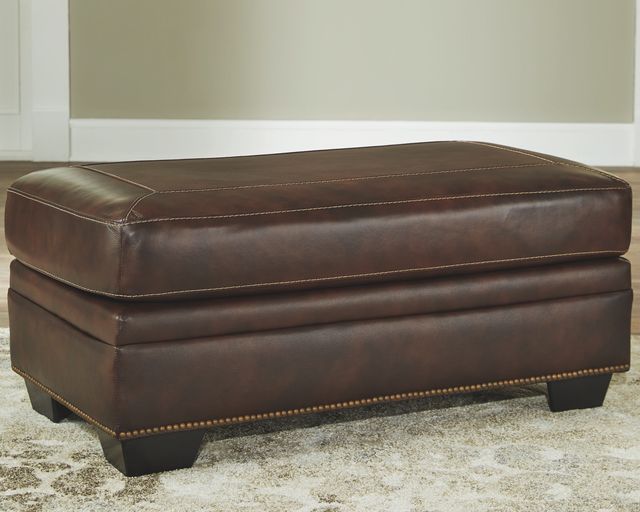 Signature Design by Ashley® Roleson Walnut Ottoman-1