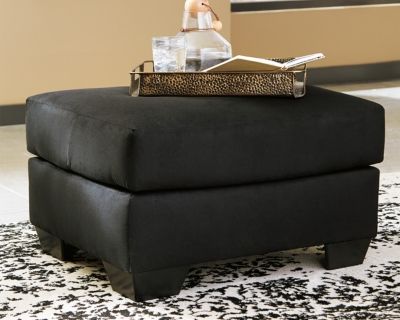 Signature Design by Ashley® Darcy Black Ottoman-1