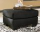 Signature Design by Ashley® Darcy Black Ottoman-1