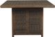 Signature Design by Ashley® Paradise Trail Medium Brown Wicker Square Bar Table with Firepit-1