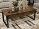 Signature Design by Ashley® Wickman Falls Dark Brown Rectangular Cocktail Table with Gunmetal Base-1
