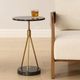 Uttermost® Rosston Black End Table with Brass Tripod-1