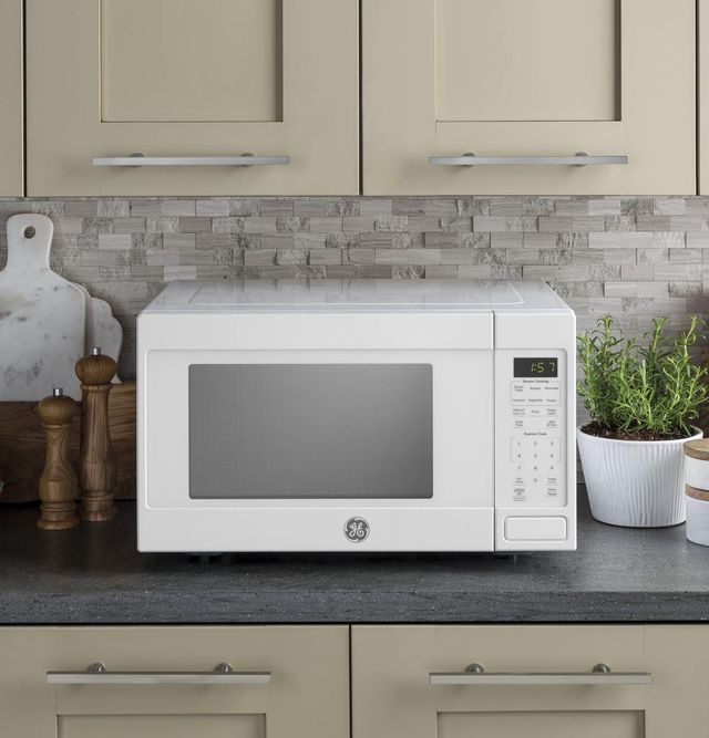 GE® 1.6 Cu. Ft. White Countertop Microwave-3