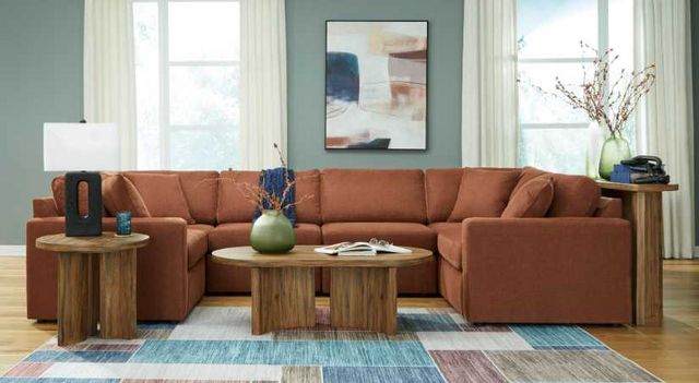front view of an orange U-shaped sectional in a modern living room
