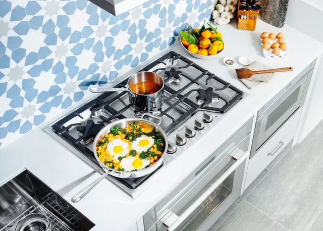 Front view of a Thermador gas cooktop in a modern kitchen