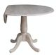 John Thomas Furniture® Dining Essentials Taupe Gray Round Drop Leaf Dining Table-0