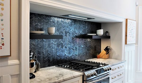 Range hood over a gas cooktop Range hood over a gas cooktop