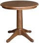 John Thomas Furniture® Dining Essentials Bourbon Oak Round Dining Table with Transitional Pedestal Base-0