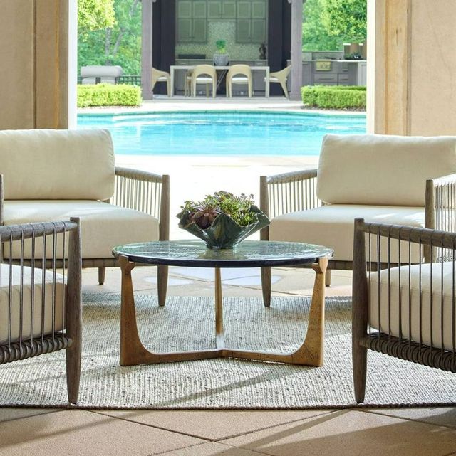 Uttermost® Bohdi Cast Glass Top Indoor-Outdoor Coffee Table with Antique Brass Aluminum Base-1