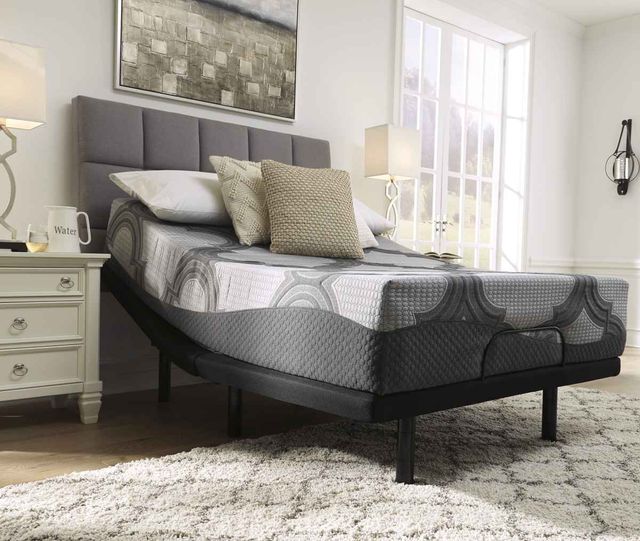 view of a full size mattress on an adjustable bed frame in a modern bedroom