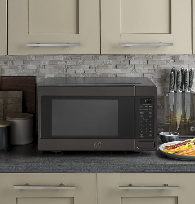 GE® 1.6 Cu. Ft. Black Stainless Steel Countertop Microwave-3
