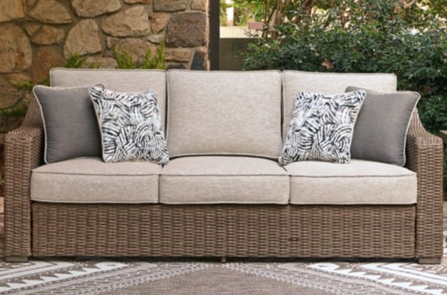 Signature Design by Ashley® Revare Beach Beige Fabric/Resin Wicker Outdoor Sofa-1