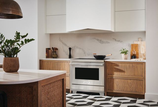 front view of a modern kitchen with a 36" wolf induction range
