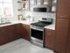 Whirlpool® 1.1 Cu. Ft. Stainless Steel Over The Range Microwave-0