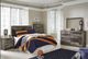 Benchcraft® Derekson 4-Piece Multi Gray Queen Panel Storage Bed Set-5
