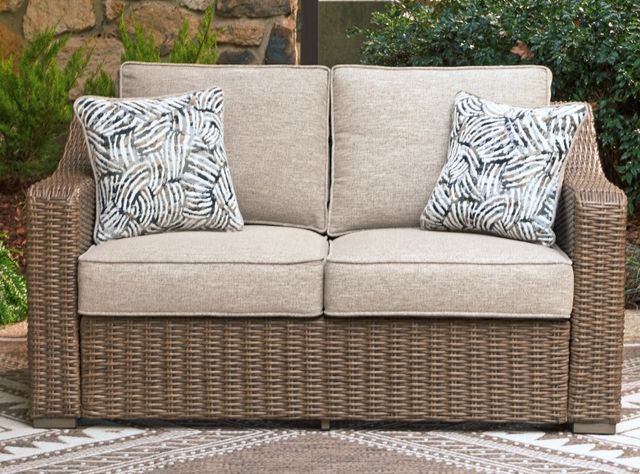 Signature Design by Ashley® Revare Beach Beige Fabric/Resin Wicker Outdoor Loveseat-1