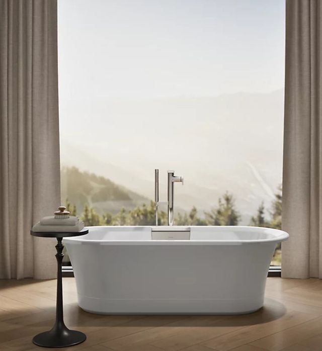 KOHLER® Volute® White 63" x 28.38" Oval Freestanding Bath with Base-4