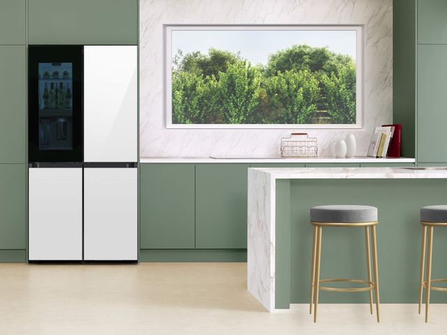Front view of a modern kitchen with a Samsung smart refrigerator Front view of a modern kitchen with a Samsung smart refrigerator