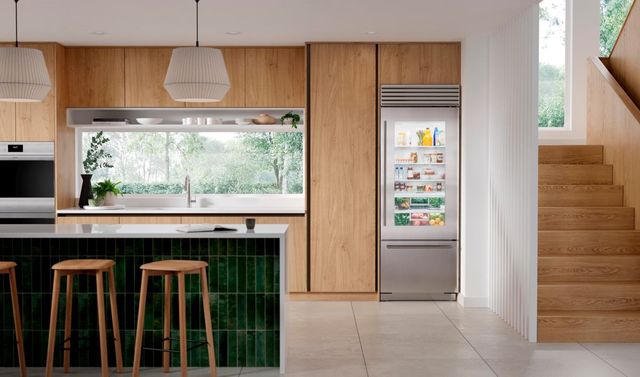 Panel-ready Sub-Zero refrigerator matching kitchen cabinets