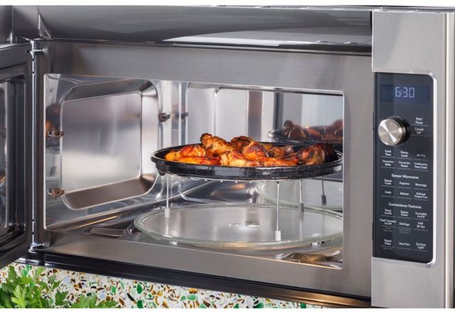 Café™ 1.7 Cu. Ft. Stainless Steel Over The Range Microwave-5