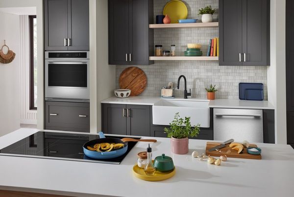 A built in oven in a wooden cabinet A built in oven in a wooden cabinet