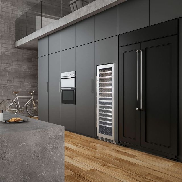 Front view of a modern kitchen with a built in wine refrigerator