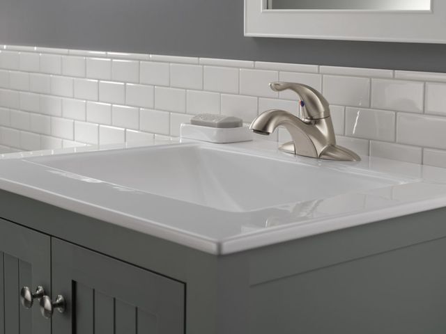 Delta Classic Stainless Single Handle Bathroom Faucet with Plastic Drain, 1.2 GPM-1