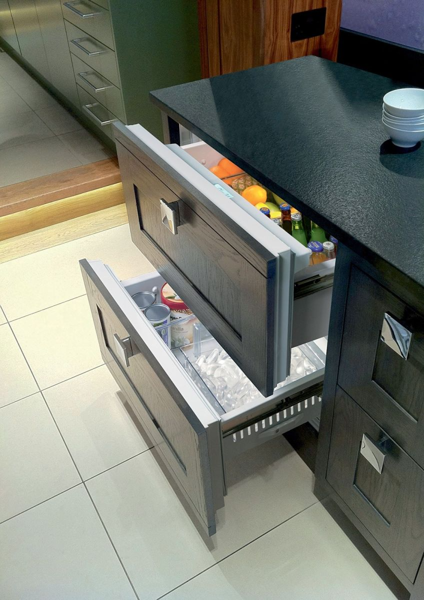 Open convertible refrigerator drawers showing deep freeze capabilities Open convertible refrigerator drawers showing deep freeze capabilities