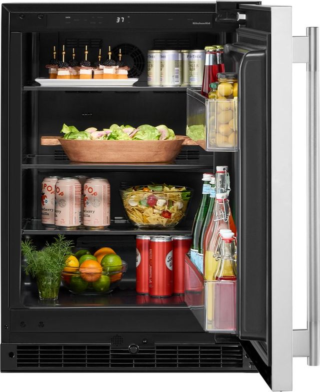 Home bar setup featuring under counter beverage centers Home bar setup featuring under counter beverage centers