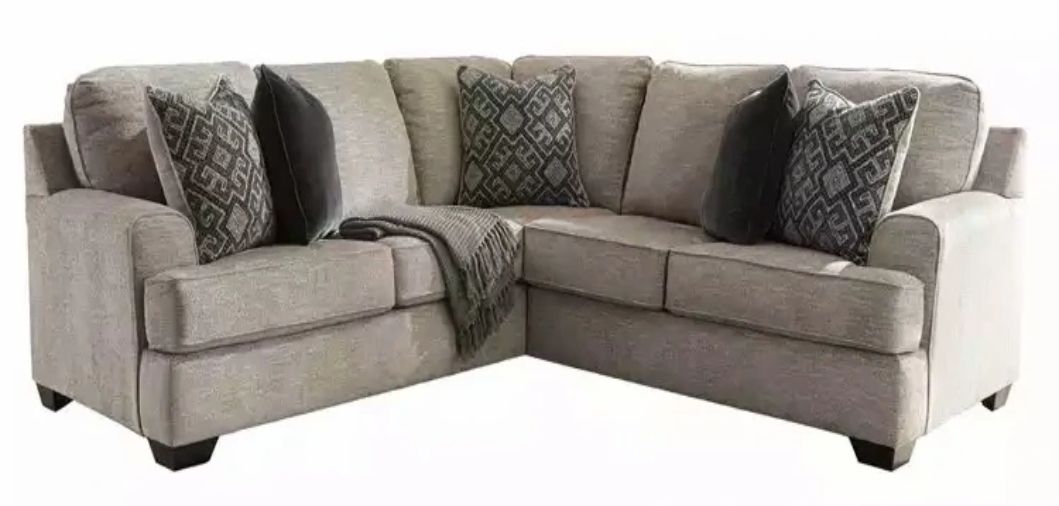 Signature Design by Ashley® Bovarian 2-Piece Curved Stone Sectional