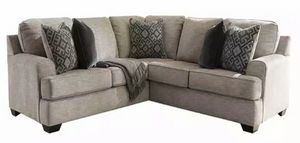 Signature Design by Ashley® Bovarian 2-Piece Curved Stone Sectional