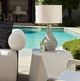 Uttermost® Stratum Light Beige Indoor-Outdoor Table Lamp with Distressed Gray Concrete Base-1