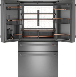Front view of the opened Café™ 36 in. 23.2 Cu. Ft. Stainless Steel Counter Depth French Door Refrigerator