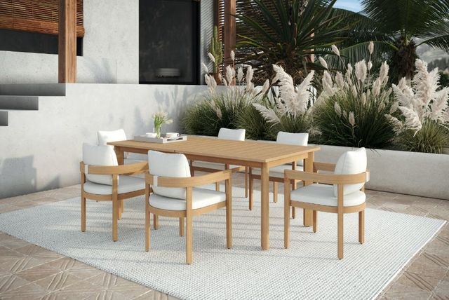 Front view of a modern outdoor patio with a modern dining table and chairs set