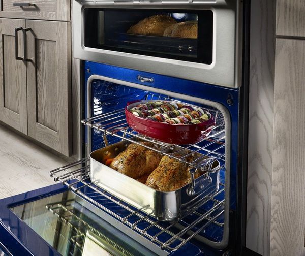 A close-up of a double oven electric range in use A close-up of a double oven electric range in use
