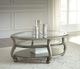 Signature Design by Ashley® Coralayne Silver Oval Coffee Table-1