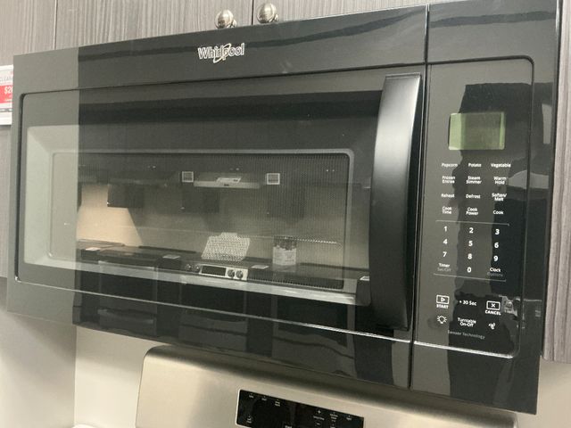 Whirlpool® 1.9 Cu. Ft. Black Over The Range Microwave-0