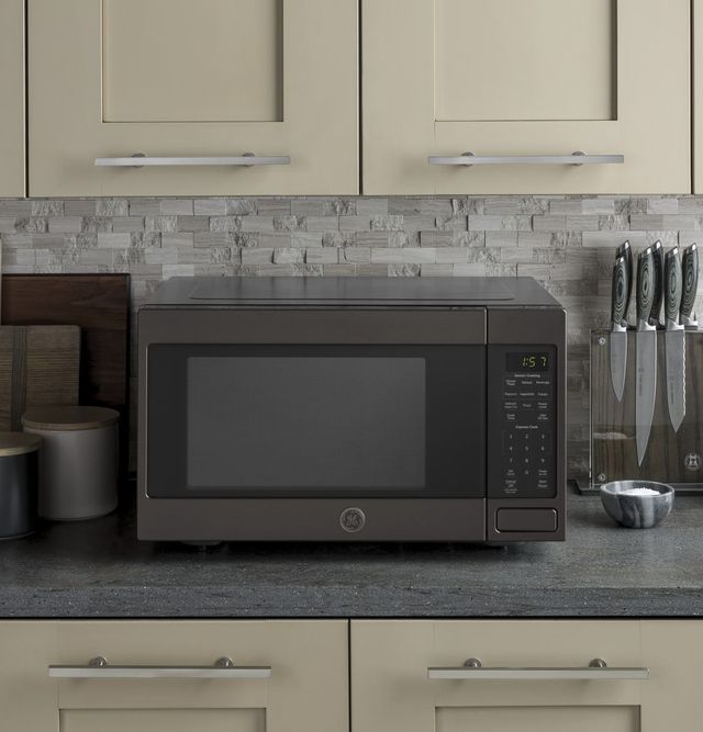 GE® 1.6 Cu. Ft. Black Stainless Steel Countertop Microwave-4