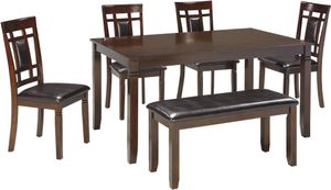 Front view of the Signature Design by Ashley® Bennox 6-Piece Brown Dining Table Set