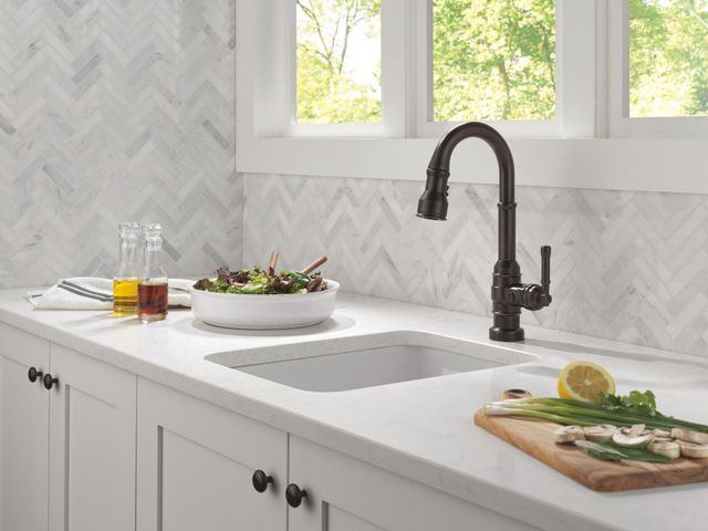 Delta Broderick® Venetian Bronze Touch2O® Bar/Prep Faucet with Touchless Technology-1