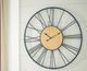 Signature Design by Ashley® Brockett Black/Natural Wall Clock-1