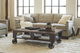 Magnussen Home® Pinebrook Distressed Natural Pine Rectangular Cocktail Table with Black Metal Casters-3
