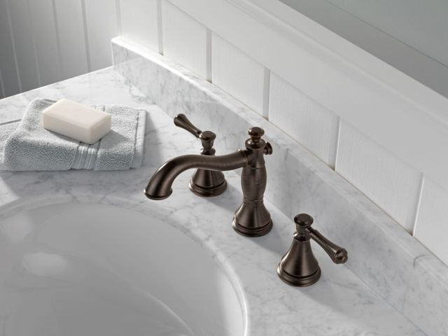 Delta Cassidy® Venetian Bronze 2-Handle Widespread Bathroom Faucet with Drain-1