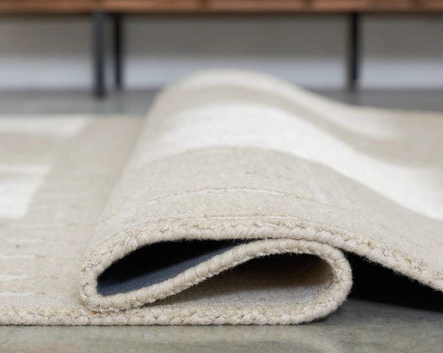 Signature Design by Ashley® Wolbert Ivory/Tan 8'x10' Area Rug-1