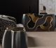 Hooker® Furniture Melange Even and Flow Black/Gold Console Table with Smoked Glass Top-1