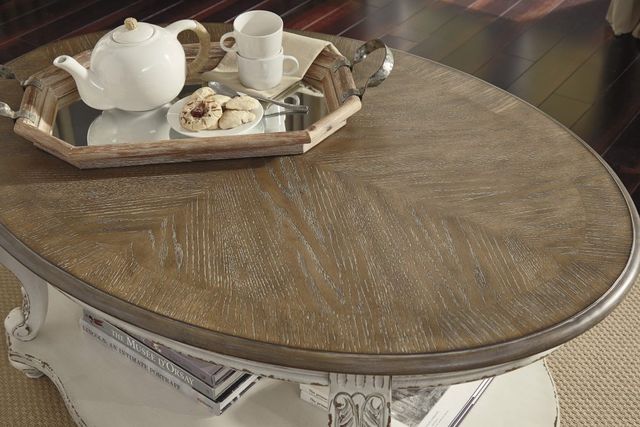 Signature Design by Ashley® Realyn Distressed Wood Oval Cocktail Table with Chipped White Base-4