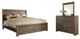 Signature Design by Ashley® Juararo 2-Piece Dark Brown Queen Panel Bed Set-0