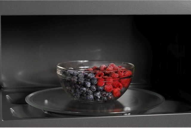 Café™ 2.1 Cu. Ft. Stainless Steel Over The Range Microwave-6