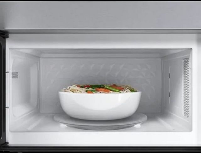 Bosch® 100 Series 1.7 Cu. Ft. Stainless Steel Over The Range Microwave-7